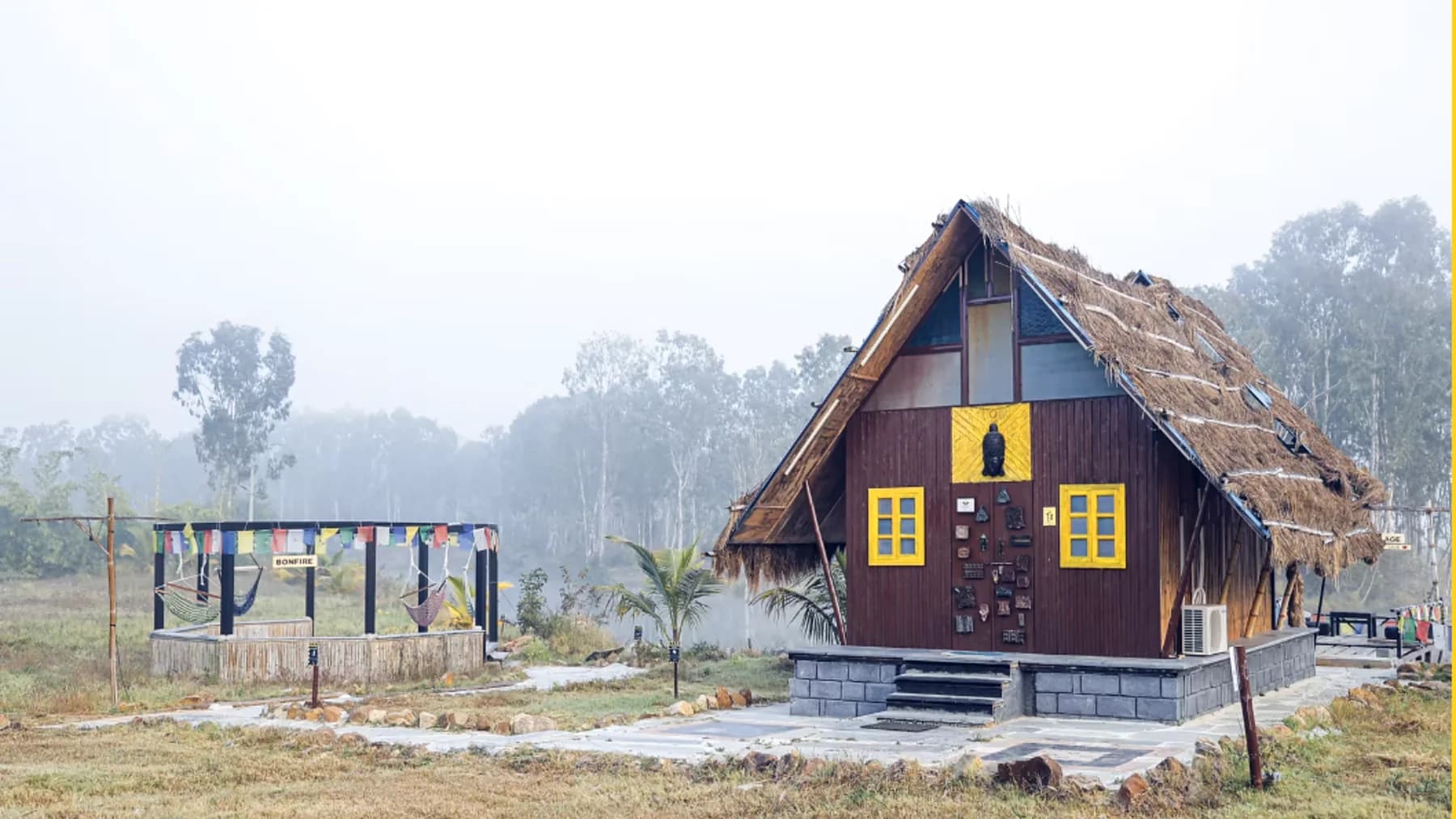 A cottage in the morning mist at Buddha Village Resort